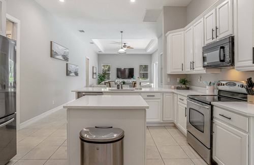 Palm River Estates Casa | Dog-friendly home close to beach with screened patio & pool, & central AC