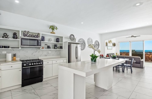 La Paloma Casa | Dog-friendly home with heated outdoor pool, hot tub, balcony, rooftop terrace