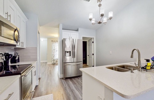 Palmetto Casa | Dog-friendly home with a private pool, home theater, sunroom, & washer/dryer