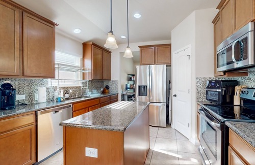 Pflugerville Casa | Dog-friendly house with patio, enclosed backyard and shared pool