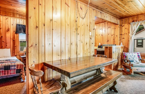 Presque Isle Cabina | Dog-friendly lakefront cabin with swimming, fishing, boating, & rec room