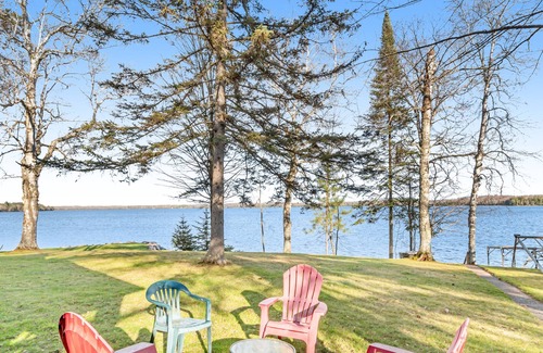 Presque Isle Casa | Dog-friendly lakefront home with fireplace, porch, water access, & rec room