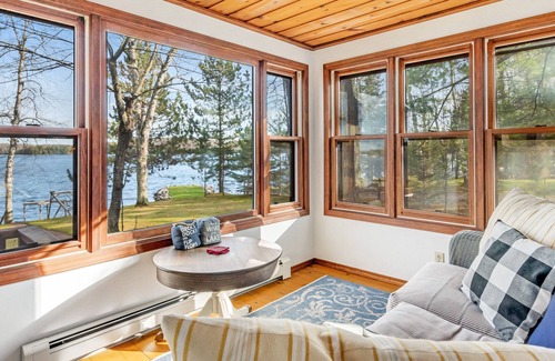 Presque Isle Casa | Dog-friendly lakefront home with fireplace, porch, water access, & rec room