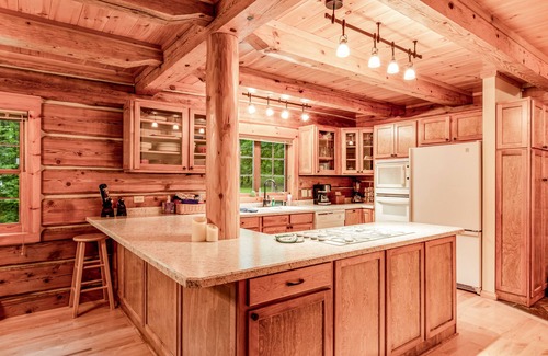 Presque Isle Casa | Dog-friendly, lakefront home with a wood fireplace, decks, dock, & AC