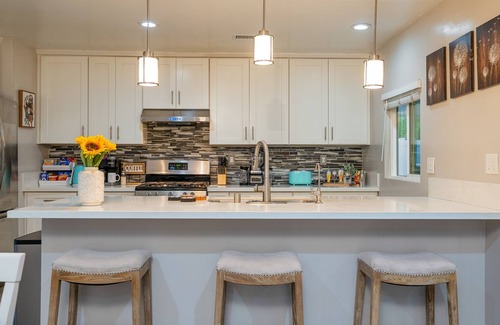 Orange Casa | Dog-friendly retreat near Disney with enclosed yard, cornhole, central AC, & W/D