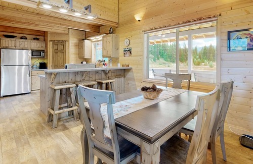 Elk City Casa | Dog-friendly riverfront home near town with deck, water views, & fireplace
