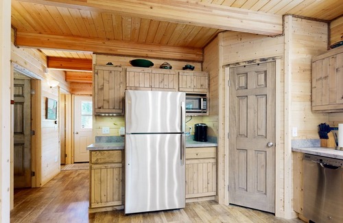 Elk City Casa | Dog-friendly riverfront home near town with deck, water views, & fireplace