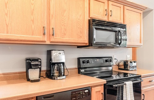 Necedah Casa | Dog-friendly riverfront retreat with huge yard, deck, grill, firepit, & kayaks