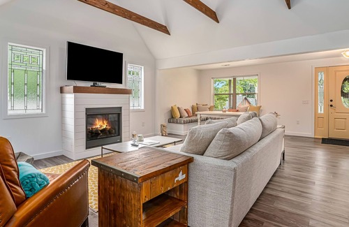 Paw Paw Lake Casa | Dog-friendly, updated home with deck, front porch, fire pit, WiFi, & fireplace
