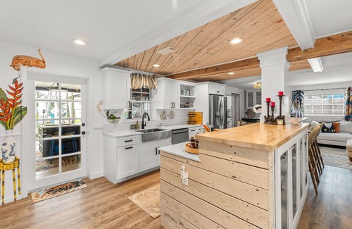 Bay Point Casa | Dog-friendly waterfront home with outdoor kitchen, bar, firepit, & kayak launch