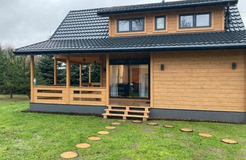 gmina Jaktorow Apartamento | Domek drewniany nad stawem