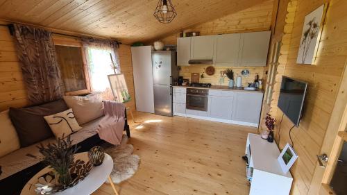 Sochaczew Casa | Domek letniskowy z jacuzzi nad rzeką Bzurą