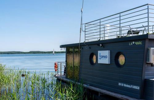 Wegorzewo Cabina | Domek na wodzie Topiko Czarter - Leśna Przystań
