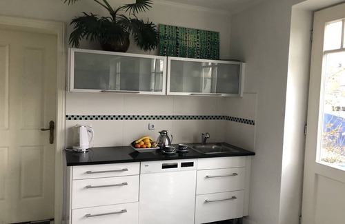 Friedrichstadt Apartamento | Domicilio en el canal en Friedrichstadt n. Mar del Norte, para 2-4 personas