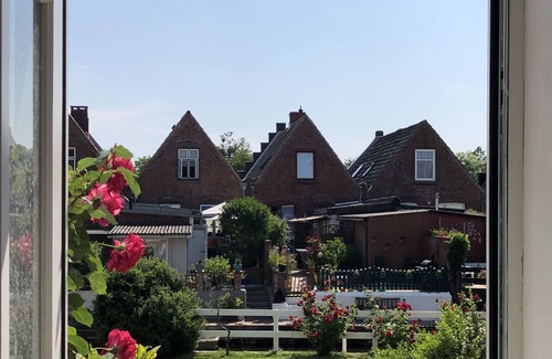 Friedrichstadt Apartamento | Domicilio en el canal en Friedrichstadt n. Mar del Norte, para 2-4 personas