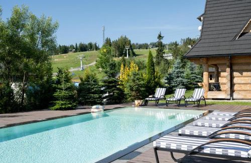 Bialka Tatrzanska Chalet De Esquí | Domki w Białce WOODHOUSE- Twój górski azyl przy stoku, z basenem i relaksem w saunie