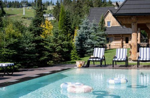 Bialka Tatrzanska Chalet De Esquí | Domki w Białce WOODHOUSE- Twój górski azyl przy stoku, z basenem i relaksem w saunie