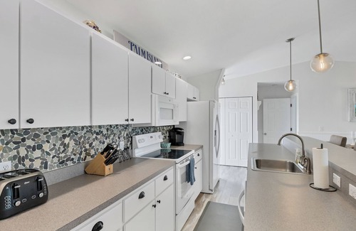 Palm Island Casa | Don't pass up this opportunity to be "A Wave From It All"!