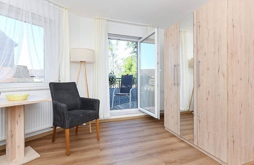 Neuharlingersiel Cabaña | Doppelzimmer mit Balkon Oder Terrasse - Doppelzimmer in der Hotel-pension Marlies