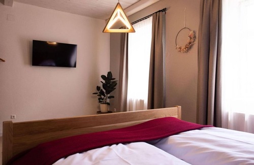 Straden Cama Y Desayuno | Double room Abendlicht - Monschein Bioweinhof