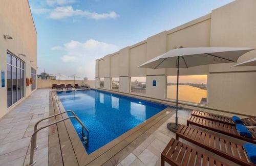 Dafan Al Nakheel Apartamento | Double Room Near Al Naeem Mall by E R