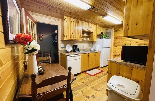 Helen Casa | Downtown by Chattahoochee River, sit on front porch as horse and buggy stroll by