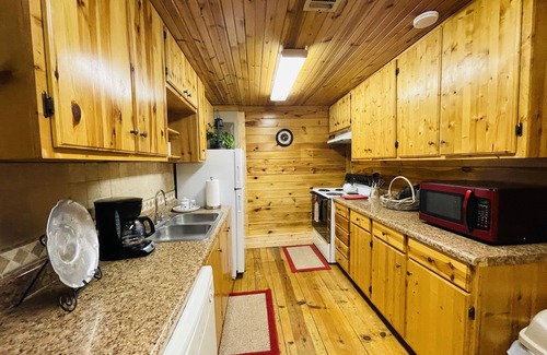 Helen Casa | Downtown by Chattahoochee River, sit on front porch as horse and buggy stroll by