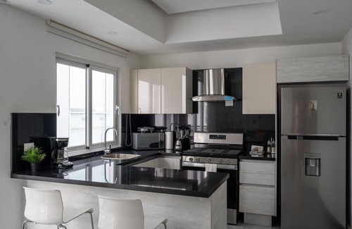 Ensanche Quisqueya Condominio | 🏙DOWNTOWN*✨COZY✨*1BR* 🩳POOL* 50MB| 5⭐️YELLOWKEY}