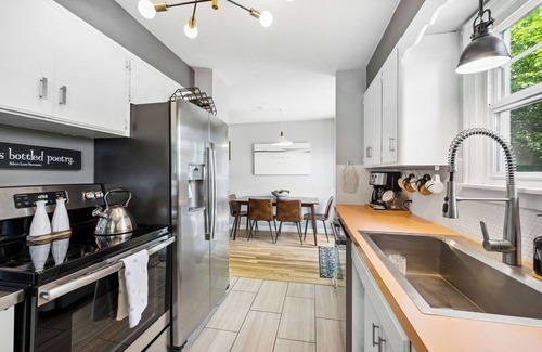 Garden District Casa | Downtown mid-century home with pet friendly, fenced yard. Sleeps 5