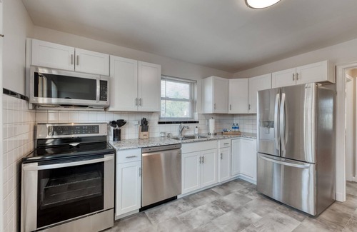 Edwardsville Casa | Downtown Midcentury Home- Walk to Everything!
