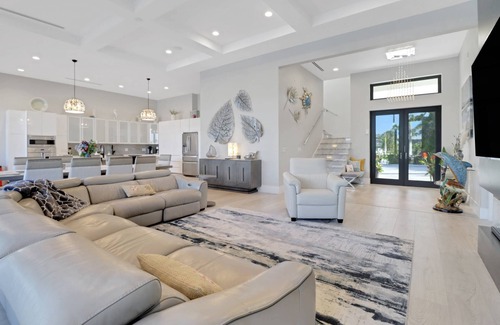 Pelican Casa | Dream Home Vacation! Stunning Waterfront! Luxurious Resort-Style Lagoon Pool, Spa & Outdoor Living!