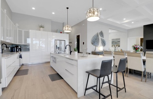 Pelican Casa | Dream Home Vacation! Stunning Waterfront! Luxurious Resort-Style Lagoon Pool, Spa & Outdoor Living!