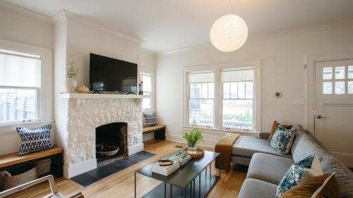 Eastwood Casa | East Nashville Retreat w Fireplace Backyard Firepit Outdoor Dining Minutes from Downtown Music Food Nightlife Chapel House by AvantStay