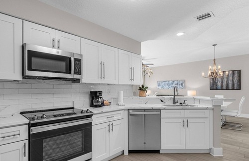 Florida Central Atlantic Coast Hotel | Easy Disney Access from Your Three Spacious, Welcoming Orlando Suites | Pool