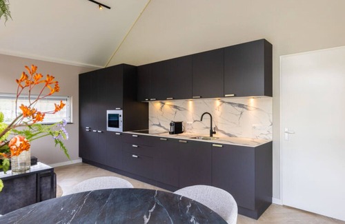 Oirschot Casa | Eco Villa in Latour by Scenic Pond