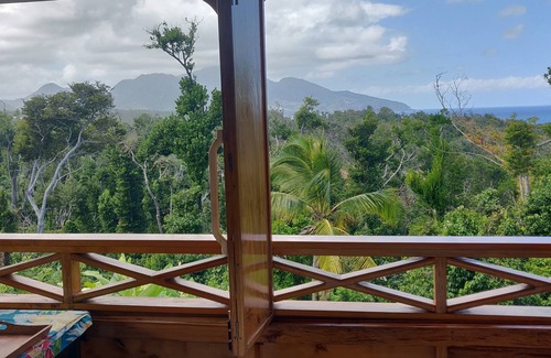 Calibishie Cabaña | Ecolodge on 25 acre estate, 2 beaches, wide variety of fruit and flowers.
