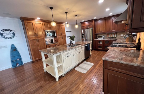 Gainesville Casa | Eight Sandals - Lakefront home on Lanier w/dock, hot tub, fire pit and game room