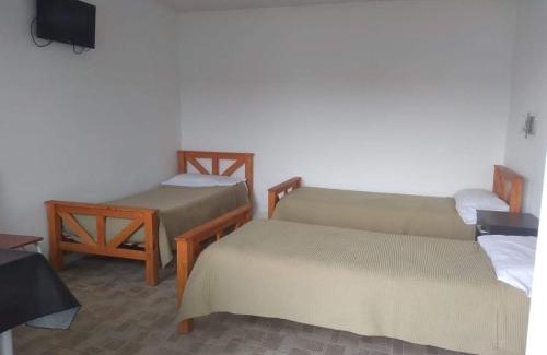 Comandante Luis Piedrabuena Apartamento | El Mastil Departamentos Dormis Habitaciones