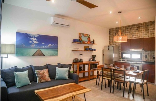 Mario Villanueva Madrid Condominio | Elegant 2-Bedroom 2-Bath Retreat with Rooftop Oasis & Pool
