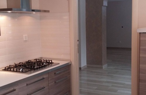 Avellino Villa | Villa elegante y confortable en la ciudad en un parque privado rodeado de vegetación.