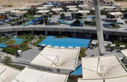 New Cairo Apartamento | elegant hotel studio Porto New Cairo pool access