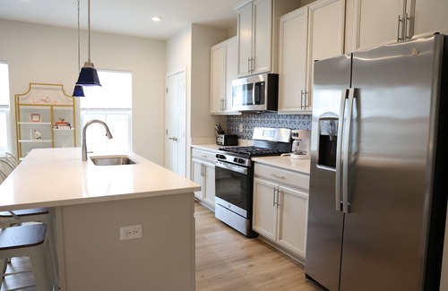 Bayside Casa | Elegant Luxury Townhome; Resort Community with Pools, Gym & close to Beaches