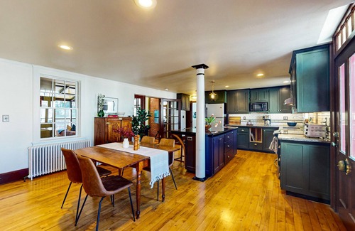 Belfast Casa | Elegant Victorian Gothic Revival home with wet bar, sunroom, & washer/dryer