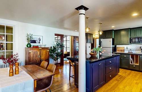 Belfast Casa | Elegant Victorian Gothic Revival home with wet bar, sunroom, & washer/dryer