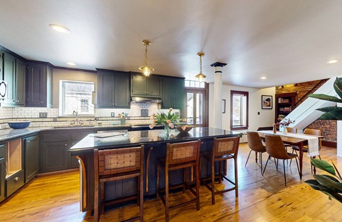 Belfast Casa | Elegant Victorian Gothic Revival home with wet bar, sunroom, & washer/dryer