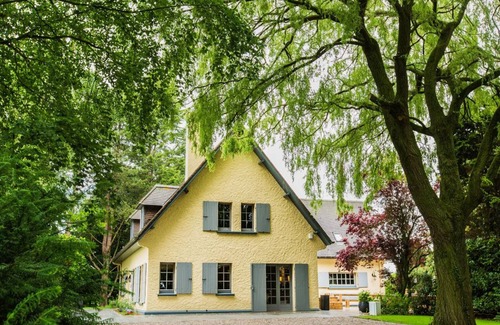 Estaires Cabaña | Elegante villa con parque, spa y capacidad para 14 personas en el corazón de la campiña flamenca