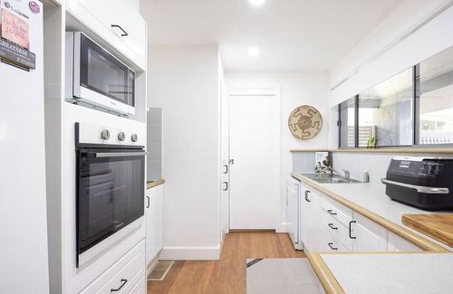 Cams Wharf Villa | Elysian Escape - 4 Pools, Lakeside, Raffertys Resort