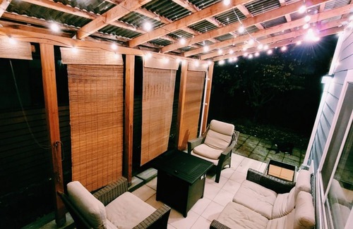 Atlantic Casa | Emerald City Retreat: Cozy 2BR Home with Backyard & Patio