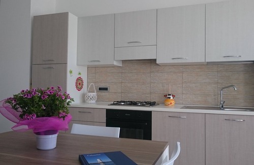 Calasetta Apartamento | A 260 metros de la playa, nuevo apartamento con terraza con vistas al mar y servicios (IUN P7111)