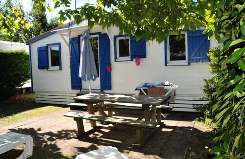 Biscarrosse Chalet De Esquí | En Chon Les Pins - Camping-Caravaning *** - Chalet wood 30m2 2 bedrooms n° 63 SATURDAY / SATURDAY 4 to 5 people - 4 pers. included in the tariff